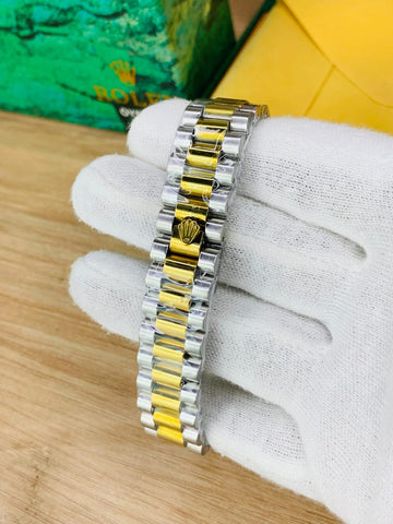 Rolex oyster perpetual two tone with white dial and date