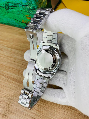 Rolex oyster perpetual silver chain with White dial and date